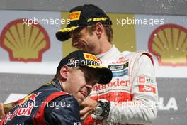 Sebastian Vettel (GER), Red Bull Racing and Jenson Button (GBR), McLaren Mercedes  02.09.2012. Formula 1 World Championship, Rd 12, Belgian Grand Prix, Spa Francorchamps, Belgium, Race Day