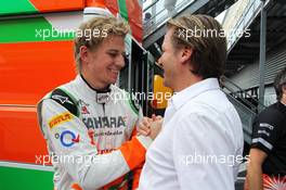 (L to R): Nico Hulkenberg (GER) Sahara Force India F1 celebrates his fourth position with Michiel Mol (NED) Sahara Force India F1 Team Co-Owner. 02.09.2012. Formula 1 World Championship, Rd 12, Belgian Grand Prix, Spa Francorchamps, Belgium, Race Day