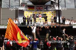 Fans invade the track during the podium. 02.09.2012. Formula 1 World Championship, Rd 12, Belgian Grand Prix, Spa Francorchamps, Belgium, Race Day