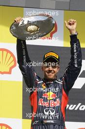 Sebastian Vettel (GER) Red Bull Racing celebrates his second position on the podium. 02.09.2012. Formula 1 World Championship, Rd 12, Belgian Grand Prix, Spa Francorchamps, Belgium, Race Day