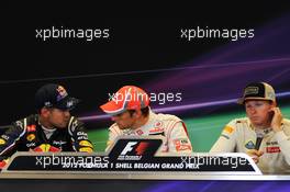 Post race FIA Press Conference (L to R): Sebastian Vettel (GER) Red Bull Racing, second; Jenson Button (GBR) McLaren, race winner; Kimi Raikkonen (FIN) Lotus F1 Team, third. 02.09.2012. Formula 1 World Championship, Rd 12, Belgian Grand Prix, Spa Francorchamps, Belgium, Race Day