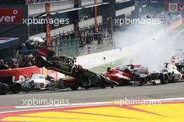 A crash at the start of the race involving Lewis Hamilton (GBR) McLaren MP4/27 and Romain Grosjean (FRA) Lotus F1 E20; Fernando Alonso (ESP) Ferrari F2012; Sergio Perez (MEX) Sauber C31 and Pastor Maldonado (VEN) Williams FW34. 02.09.2012. Formula 1 World Championship, Rd 12, Belgian Grand Prix, Spa Francorchamps, Belgium, Race Day