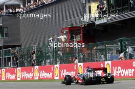 Race winner Jenson Button (GBR) McLaren MP4/27 the takes the chequered flag at the end of the race. 02.09.2012. Formula 1 World Championship, Rd 12, Belgian Grand Prix, Spa Francorchamps, Belgium, Race Day