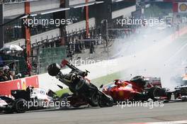 A crash at the start of the race involving Lewis Hamilton (GBR) McLaren MP4/27 and Romain Grosjean (FRA) Lotus F1 E20; Fernando Alonso (ESP) Ferrari F2012; Sergio Perez (MEX) Sauber C31 and Pastor Maldonado (VEN) Williams FW34. 02.09.2012. Formula 1 World Championship, Rd 12, Belgian Grand Prix, Spa Francorchamps, Belgium, Race Day