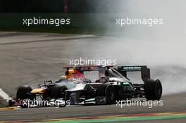 (L to R): Sebastian Vettel (GER) Red Bull Racing RB8 and Michael Schumacher (GER) Mercedes AMG F1 W03 battle for position. 02.09.2012. Formula 1 World Championship, Rd 12, Belgian Grand Prix, Spa Francorchamps, Belgium, Race Day
