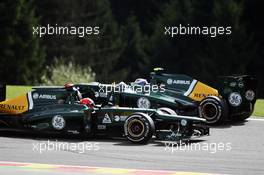 Heikki Kovalainen (FIN) Caterham CT01 spins and team mate Vitaly Petrov (RUS) Caterham CT01 passes him. 02.09.2012. Formula 1 World Championship, Rd 12, Belgian Grand Prix, Spa Francorchamps, Belgium, Race Day