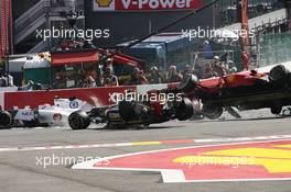 A crash at the start of the race involving Lewis Hamilton (GBR) McLaren MP4/27 and Romain Grosjean (FRA) Lotus F1 E20; Fernando Alonso (ESP) Ferrari F2012; Sergio Perez (MEX) Sauber C31 and Pastor Maldonado (VEN) Williams FW34. 02.09.2012. Formula 1 World Championship, Rd 12, Belgian Grand Prix, Spa Francorchamps, Belgium, Race Day