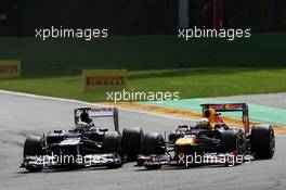 (L to R): Bruno Senna (BRA) Williams FW34 and Sebastian Vettel (GER) Red Bull Racing battle for position. 02.09.2012. Formula 1 World Championship, Rd 12, Belgian Grand Prix, Spa Francorchamps, Belgium, Race Day