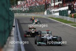 Michael Schumacher (GER), Mercedes GP leads Kimi Raikkonen (FIN), Lotus F1 Team  02.09.2012. Formula 1 World Championship, Rd 12, Belgian Grand Prix, Spa Francorchamps, Belgium, Race Day