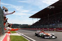 Nico Hulkenberg (GER) Sahara Force India F1 VJM05 celebrates his fourth position at the end of the race as he passes his team. 02.09.2012. Formula 1 World Championship, Rd 12, Belgian Grand Prix, Spa Francorchamps, Belgium, Race Day