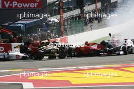 A crash at the start of the race involving Lewis Hamilton (GBR) McLaren MP4/27 and Romain Grosjean (FRA) Lotus F1 E20; Fernando Alonso (ESP) Ferrari F2012; Sergio Perez (MEX) Sauber C31 and Pastor Maldonado (VEN) Williams FW34. 02.09.2012. Formula 1 World Championship, Rd 12, Belgian Grand Prix, Spa Francorchamps, Belgium, Race Day