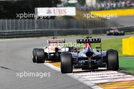 Paul di Resta (GBR) Sahara Force India VJM05 leads Mark Webber (AUS) Red Bull Racing RB8. 02.09.2012. Formula 1 World Championship, Rd 12, Belgian Grand Prix, Spa Francorchamps, Belgium, Race Day