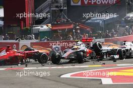 A crash at the start of the race involving Lewis Hamilton (GBR) McLaren MP4/27 and Romain Grosjean (FRA) Lotus F1 E20; Fernando Alonso (ESP) Ferrari F2012; Sergio Perez (MEX) Sauber C31 and Pastor Maldonado (VEN) Williams FW34. 02.09.2012. Formula 1 World Championship, Rd 12, Belgian Grand Prix, Spa Francorchamps, Belgium, Race Day