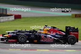 (L to R): Bruno Senna (BRA) Williams FW34 and Sebastian Vettel (GER) Red Bull Racing battle for position. 02.09.2012. Formula 1 World Championship, Rd 12, Belgian Grand Prix, Spa Francorchamps, Belgium, Race Day