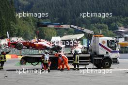 The Ferrari F2012 of Fernando Alonso (ESP) Ferrari is craned away after a crash at the start of the race. 02.09.2012. Formula 1 World Championship, Rd 12, Belgian Grand Prix, Spa Francorchamps, Belgium, Race Day