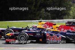 Mark Webber (AUS) Red Bull Racing RB8 and team mate Sebastian Vettel (GER) Red Bull Racing RB8 battle for position. 02.09.2012. Formula 1 World Championship, Rd 12, Belgian Grand Prix, Spa Francorchamps, Belgium, Race Day