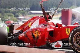 The Ferrari F2012 of Fernando Alonso (ESP) Ferrari is craned away after a crash at the start of the race. 02.09.2012. Formula 1 World Championship, Rd 12, Belgian Grand Prix, Spa Francorchamps, Belgium, Race Day