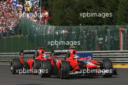 Charles Pic (FRA) Marussia F1 Team MR01 leads Timo Glock (GER) Marussia F1 Team MR01. 02.09.2012. Formula 1 World Championship, Rd 12, Belgian Grand Prix, Spa Francorchamps, Belgium, Race Day