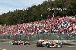 Nico Hulkenberg (GER) Sahara Force India F1 VJM05 leads Kimi Raikkonen (FIN) Lotus F1 E20. 02.09.2012. Formula 1 World Championship, Rd 12, Belgian Grand Prix, Spa Francorchamps, Belgium, Race Day