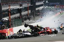 A crash at the start of the race involving Lewis Hamilton (GBR) McLaren MP4/27 and Romain Grosjean (FRA) Lotus F1 E20; Fernando Alonso (ESP) Ferrari F2012; Sergio Perez (MEX) Sauber C31 and Pastor Maldonado (VEN) Williams FW34. 02.09.2012. Formula 1 World Championship, Rd 12, Belgian Grand Prix, Spa Francorchamps, Belgium, Race Day