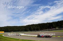 Jenson Button (GBR) McLaren MP4/27 leads Sebastian Vettel (GER) Red Bull Racing RB8. 02.09.2012. Formula 1 World Championship, Rd 12, Belgian Grand Prix, Spa Francorchamps, Belgium, Race Day