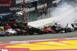 A crash at the start of the race involving Lewis Hamilton (GBR) McLaren MP4/27 and Romain Grosjean (FRA) Lotus F1 E20; Fernando Alonso (ESP) Ferrari F2012; Sergio Perez (MEX) Sauber C31 and Pastor Maldonado (VEN) Williams FW34. 02.09.2012. Formula 1 World Championship, Rd 12, Belgian Grand Prix, Spa Francorchamps, Belgium, Race Day