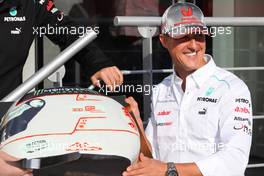 Michael Schumacher (GER) Mercedes AMG F1 celebrates his 300th GP 01.09.2012. Formula 1 World Championship, Rd 12, Belgian Grand Prix, Spa Francorchamps, Belgium, Qualifying Day