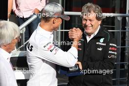 Michael Schumacher (GER) Mercedes AMG F1 celebrates his 300th GP with Bernie Ecclestone (GBR) CEO Formula One Group (FOM) and Norbert Haug (GER) Mercedes Sporting Director. 01.09.2012. Formula 1 World Championship, Rd 12, Belgian Grand Prix, Spa Francorchamps, Belgium, Qualifying Day