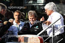(L to R):  Ross Brawn (GBR) Mercedes AMG F1 Team Principal; Norbert Haug (GER) Mercedes Sporting Director and Bernie Ecclestone (GBR) CEO Formula One Group (FOM) enjoy a cake forthe 300th GP of Michael Schumacher (GER) Mercedes AMG F1  01.09.2012. Formula 1 World Championship, Rd 12, Belgian Grand Prix, Spa Francorchamps, Belgium, Qualifying Day