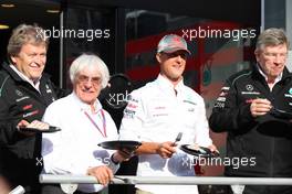 Michael Schumacher (GER) Mercedes AMG F1 celebrates his 300th GP with Ross Brawn (GBR) Mercedes AMG F1 Team Principal; Bernie Ecclestone (GBR) CEO Formula One Group (FOM) and Norbert Haug (GER) Mercedes Sporting Director. 01.09.2012. Formula 1 World Championship, Rd 12, Belgian Grand Prix, Spa Francorchamps, Belgium, Qualifying Day