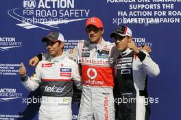 Qualifying parc ferme (L to R): Kamui Kobayashi (JPN) Sauber, second; Jenson Button (GBR) McLaren, pole position; Pastor Maldonado (VEN) Williams, third. 01.09.2012. Formula 1 World Championship, Rd 12, Belgian Grand Prix, Spa Francorchamps, Belgium, Qualifying Day