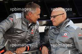 (L to R): Martin Whitmarsh (GBR) McLaren Chief Executive Officer with Matt Bishop (GBR) McLaren Press Officer. 01.09.2012. Formula 1 World Championship, Rd 12, Belgian Grand Prix, Spa Francorchamps, Belgium, Qualifying Day