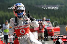 Jenson Button (GBR) McLaren celebrates his pole position in parc ferme. 01.09.2012. Formula 1 World Championship, Rd 12, Belgian Grand Prix, Spa Francorchamps, Belgium, Qualifying Day