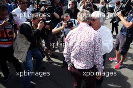 (L to R): Eddie Jordan (IRE) BBC Television Pundit with Bernie Ecclestone (GBR) CEO Formula One Group (FOM). 02.09.2012. Formula 1 World Championship, Rd 12, Belgian Grand Prix, Spa Francorchamps, Belgium, Race Day