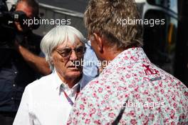 (L to R): Bernie Ecclestone (GBR) CEO Formula One Group (FOM) with Eddie Jordan (IRE) BBC Television Pundit. 02.09.2012. Formula 1 World Championship, Rd 12, Belgian Grand Prix, Spa Francorchamps, Belgium, Race Day