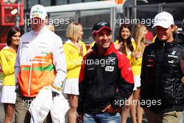 (L to R): Nico Hulkenberg (GER) Sahara Force India F1 with Timo Glock (GER) Marussia F1 Team and Nico Rosberg (GER) Mercedes AMG F1 on the drivers parade. 02.09.2012. Formula 1 World Championship, Rd 12, Belgian Grand Prix, Spa Francorchamps, Belgium, Race Day