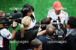 Jenson Button (GBR) McLaren with the media. 30.08.2012. Formula 1 World Championship, Rd 12, Belgian Grand Prix, Spa Francorchamps, Belgium, Preparation Day