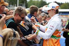 Nico Hulkenberg (GER) Sahara Force India F1 signs autographs for the fans. 30.08.2012. Formula 1 World Championship, Rd 12, Belgian Grand Prix, Spa Francorchamps, Belgium, Preparation Day