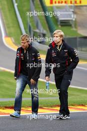Sebastian Vettel (GER) Red Bull Racing walks the circuit and climbs Eau Rouge with Heikki Huovinen (FIN) Personal Trainer. 30.08.2012. Formula 1 World Championship, Rd 12, Belgian Grand Prix, Spa Francorchamps, Belgium, Preparation Day