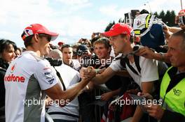Jenson Button (GBR) McLaren with the fans. 30.08.2012. Formula 1 World Championship, Rd 12, Belgian Grand Prix, Spa Francorchamps, Belgium, Preparation Day