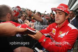 Fernando Alonso (ESP), Scuderia Ferrari signing autographs for the fans 30.08.2012. Formula 1 World Championship, Rd 12, Belgian Grand Prix, Spa Francorchamps, Belgium, Preparation Day
