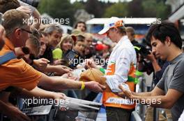 (L to R): Nico Hulkenberg (GER) Sahara Force India F1 and Sergio Perez (MEX) Sauber sign autographs for the fans. 30.08.2012. Formula 1 World Championship, Rd 12, Belgian Grand Prix, Spa Francorchamps, Belgium, Preparation Day