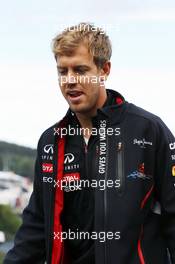 Sebastian Vettel (GER) Red Bull Racing walks the circuit and climbs Eau Rouge. 30.08.2012. Formula 1 World Championship, Rd 12, Belgian Grand Prix, Spa Francorchamps, Belgium, Preparation Day