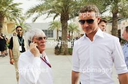 (L to R): Bernie Ecclestone (GBR) CEO Formula One Group (FOM) with David Coulthard (GBR) Red Bull Racing and Scuderia Toro Advisor / BBC Television Commentator. 20.04.2012. Formula 1 World Championship, Rd 4, Bahrain Grand Prix, Sakhir, Bahrain, Practice Day