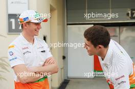 (L to R): Nico Hulkenberg (GER) Sahara Force India F1 with team mate Paul di Resta (GBR) Sahara Force India F1. 20.04.2012. Formula 1 World Championship, Rd 4, Bahrain Grand Prix, Sakhir, Bahrain, Practice Day