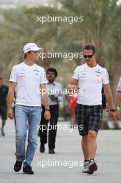 (L to R): Nico Rosberg (GER) Mercedes AMG F1 with team mate Michael Schumacher (GER) Mercedes AMG F1. 20.04.2012. Formula 1 World Championship, Rd 4, Bahrain Grand Prix, Sakhir, Bahrain, Practice Day