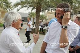 (L to R): Bernie Ecclestone (GBR) CEO Formula One Group (FOM) with David Coulthard (GBR) Red Bull Racing and Scuderia Toro Advisor / BBC Television Commentator. 20.04.2012. Formula 1 World Championship, Rd 4, Bahrain Grand Prix, Sakhir, Bahrain, Practice Day