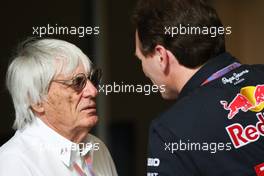 (L to R): Bernie Ecclestone (GBR) CEO Formula One Group (FOM) talks with Christian Horner (GBR) Red Bull Racing Team Principal. 20.04.2012. Formula 1 World Championship, Rd 4, Bahrain Grand Prix, Sakhir, Bahrain, Practice Day