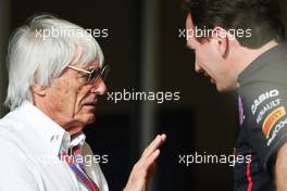 (L to R): Bernie Ecclestone (GBR) CEO Formula One Group (FOM) talks with Christian Horner (GBR) Red Bull Racing Team Principal. 20.04.2012. Formula 1 World Championship, Rd 4, Bahrain Grand Prix, Sakhir, Bahrain, Practice Day