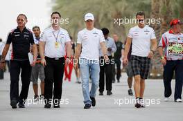 (L to R): Nico Rosberg (GER) Mercedes AMG F1 with team mate Michael Schumacher (GER) Mercedes AMG F1. 20.04.2012. Formula 1 World Championship, Rd 4, Bahrain Grand Prix, Sakhir, Bahrain, Practice Day